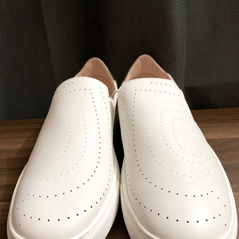 Brand new Kate spade slip on  gold and white shoe.